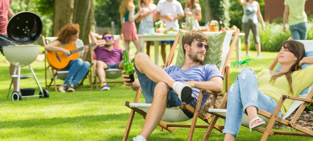 Couple outside at family picnic 